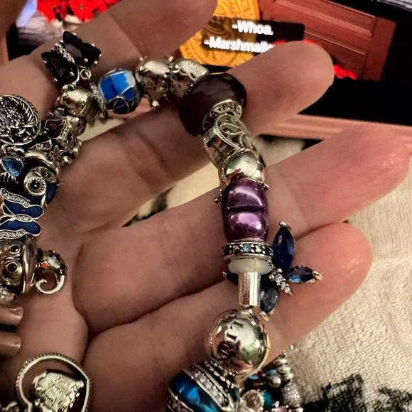 Linx bracelet with owl and butterfly charms